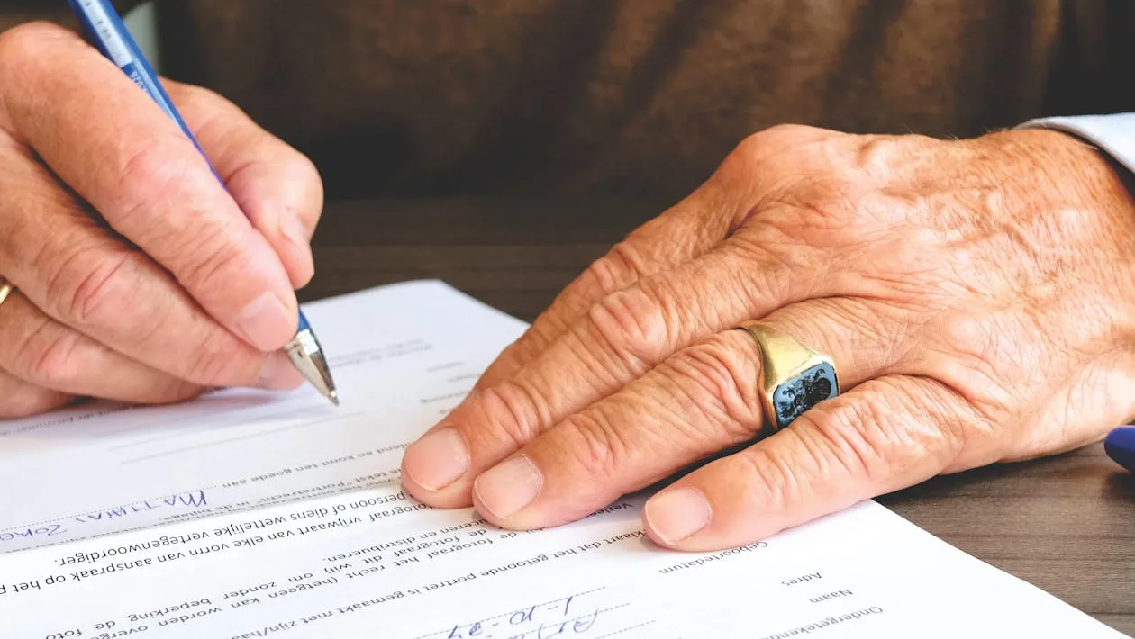 Person signing legal will documents