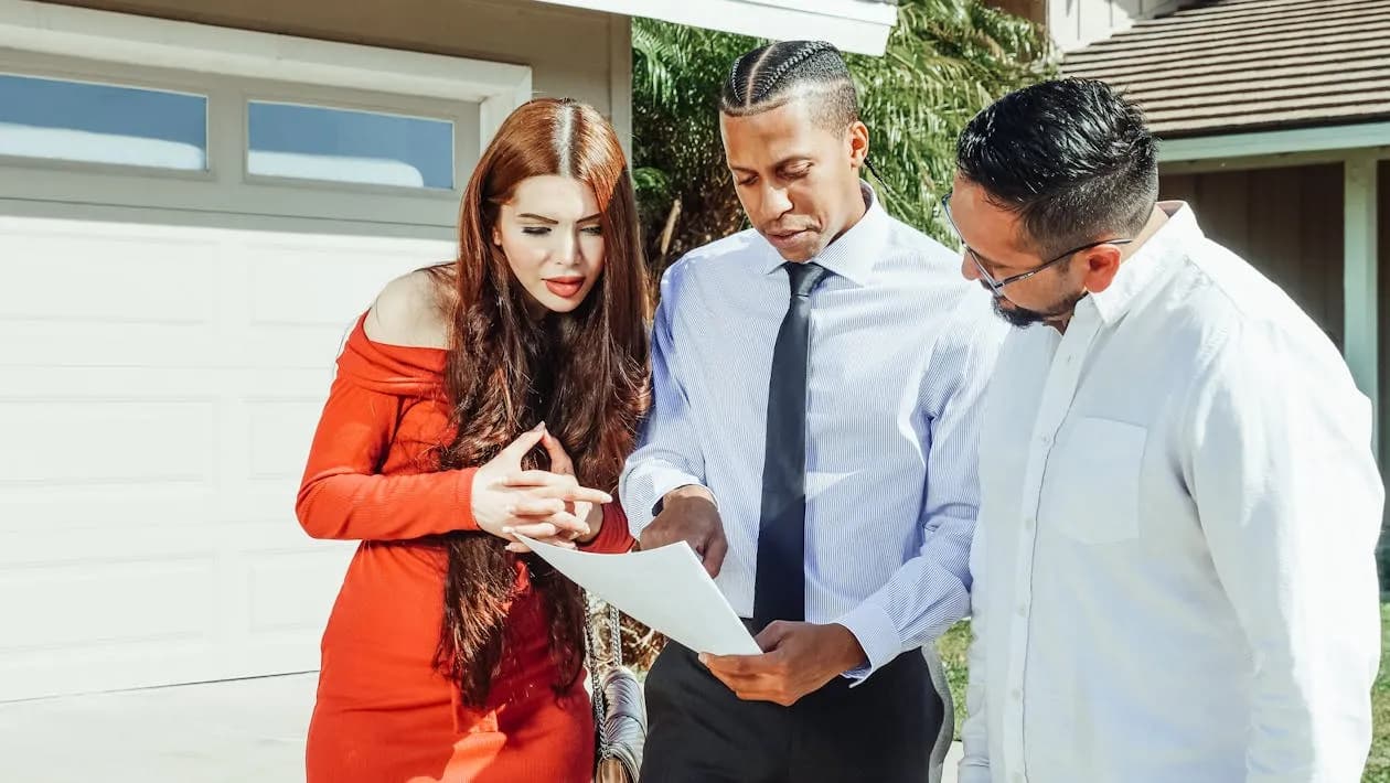 Two people discussing estate documents