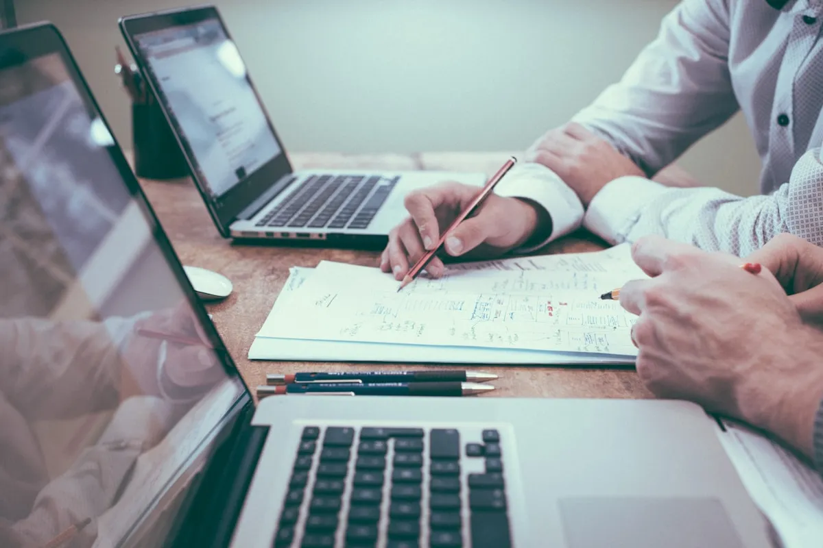 Person reviewing inheritance documents at desk