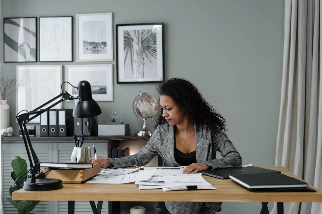 Businesswoman reviewing executor documents